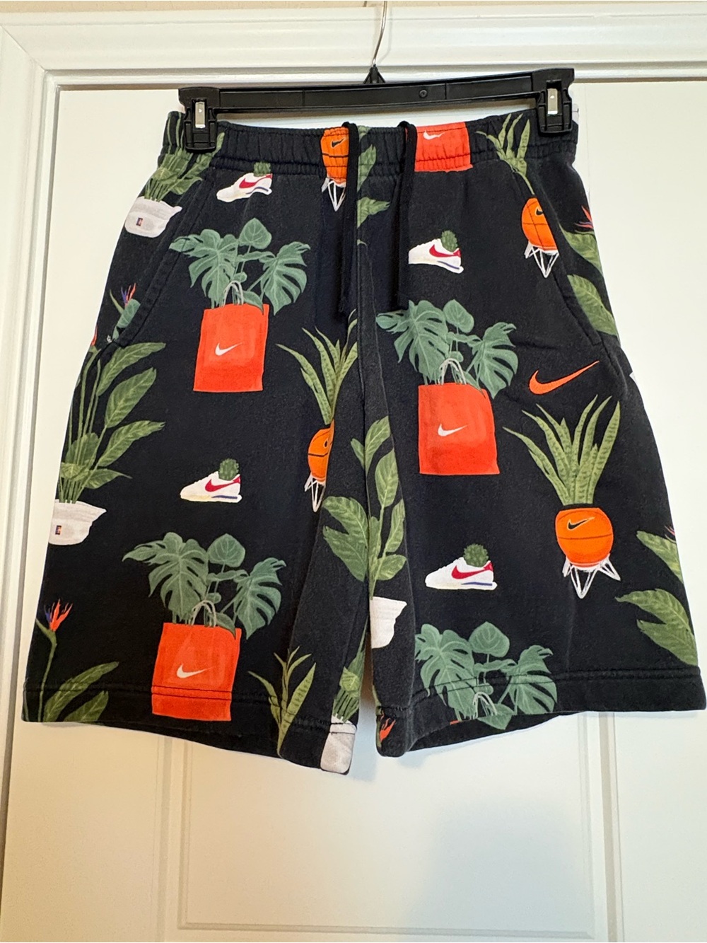 Nike Black Shorts with Orange Planter & Green Plant Graphics
